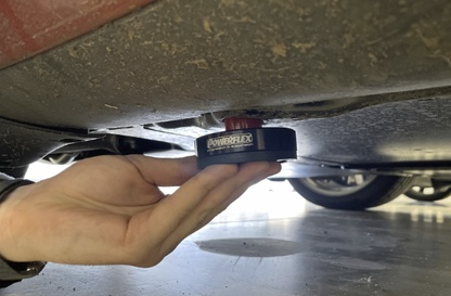 https://www.powerflexusa.com/web/image/304893/PFUSA-blog-Tesla-Model-S-3-X-Y-Jack-Pad-Adapter-Being-Installed.jpg?access_token=b18eef6b-f2da-46ed-bd63-7ec510da8be9